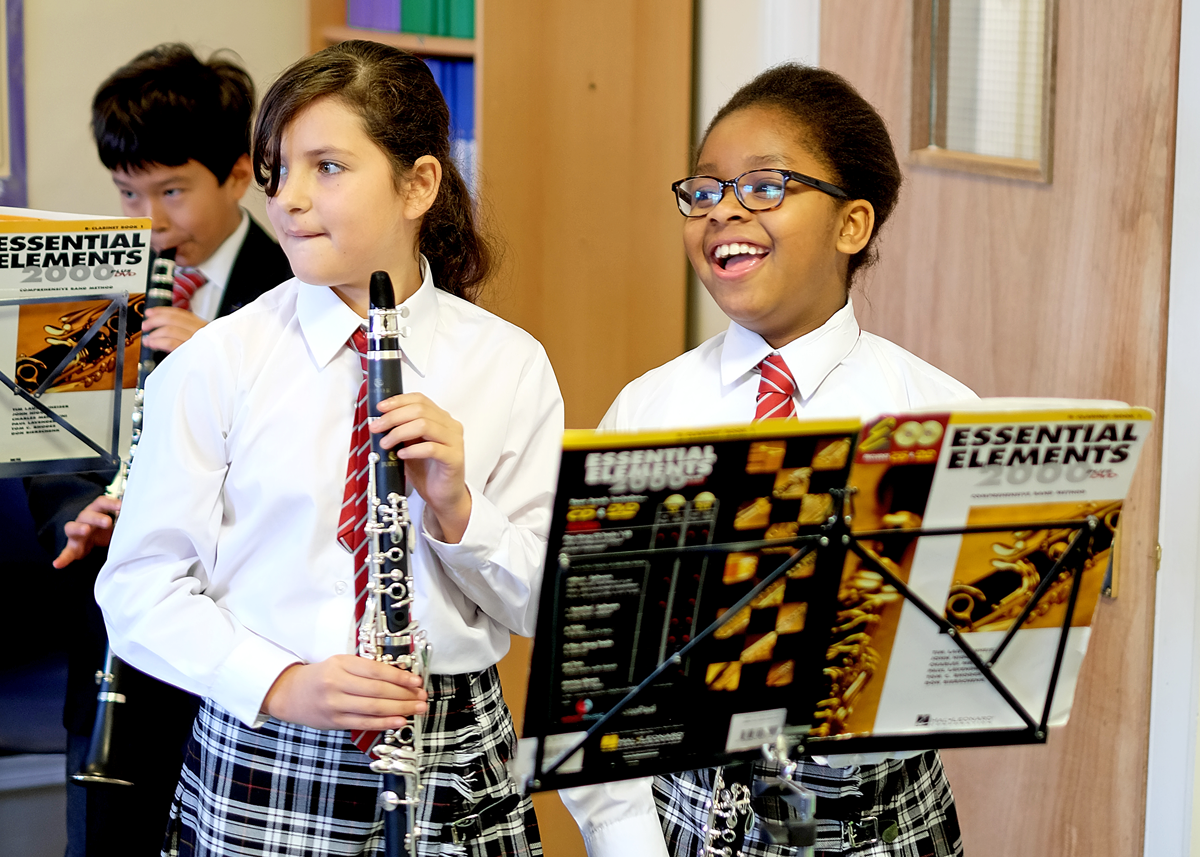 Abercorn School putting the clarinet together - photography by Olivia Wild . Howarth of London